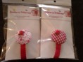 Portachupetes rojos